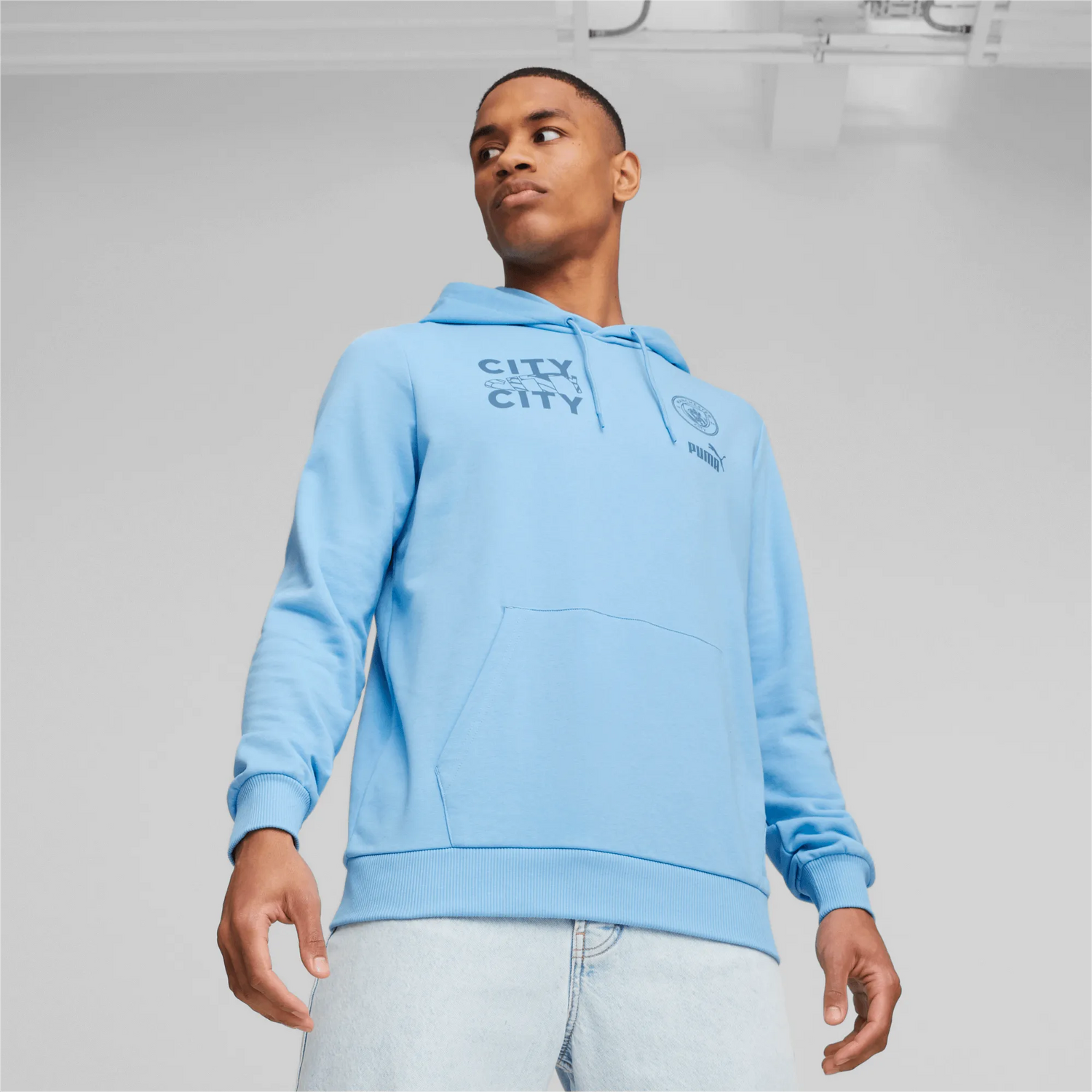 Puma 2023-24 Manchester City Men's Ftbl Core Graphic Hoody (Model - Front)