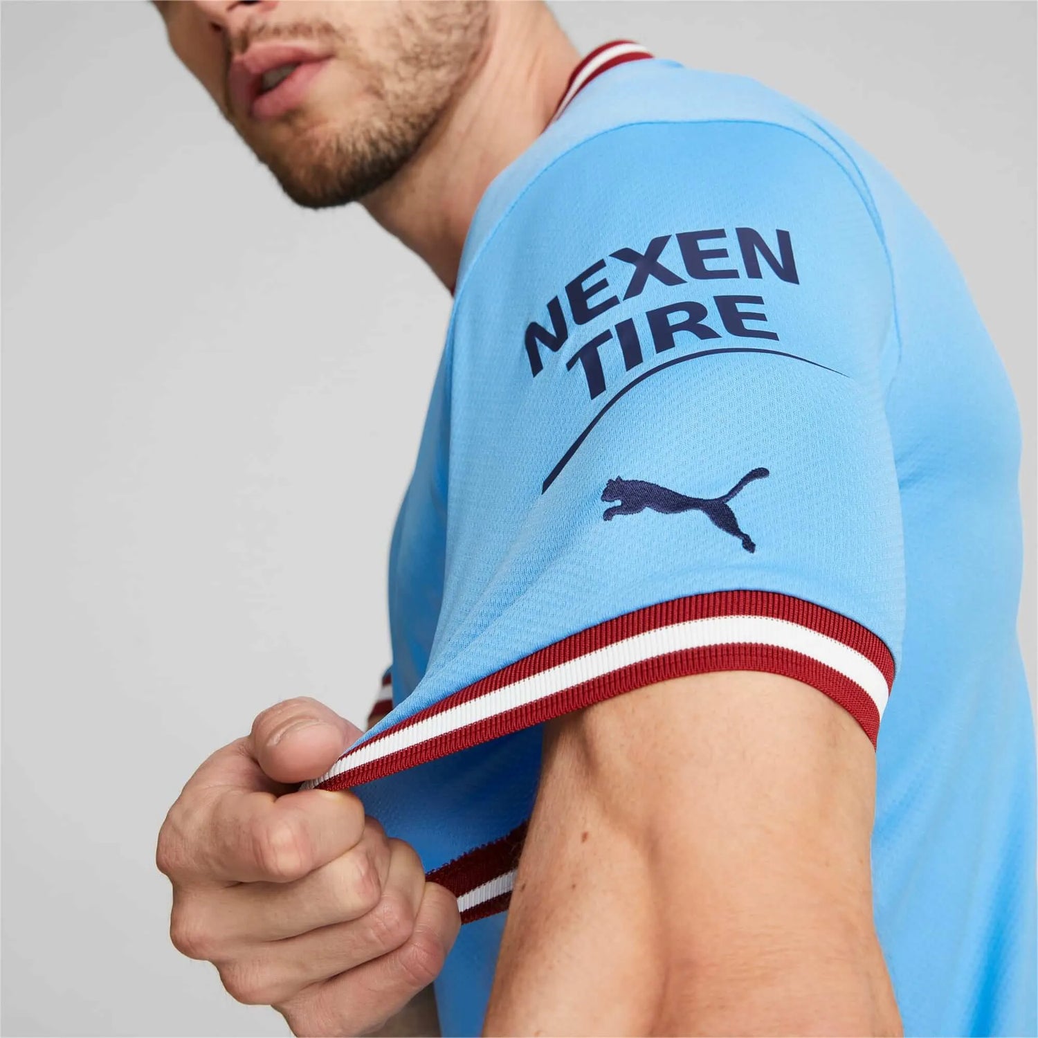 Puma 2022-23 Manchester City Home Jersey - Light Blue-Intense Red (Detail 1)